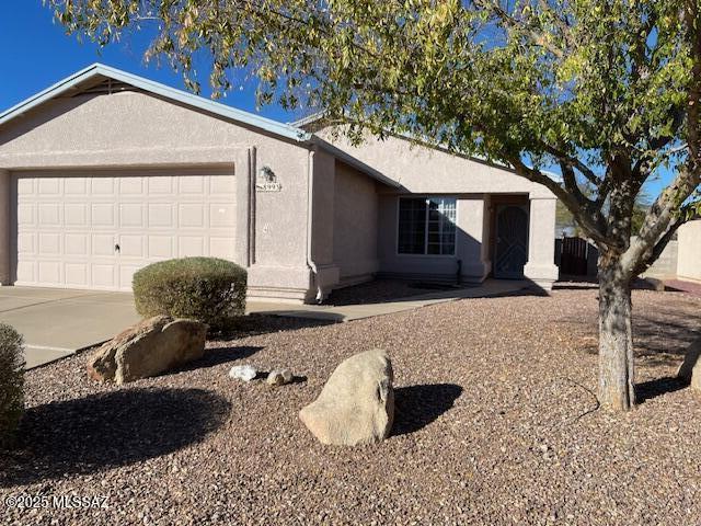 ranch-style house with a garage