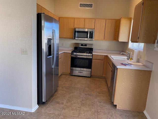 kitchen featuring sink and stainless steel appliances