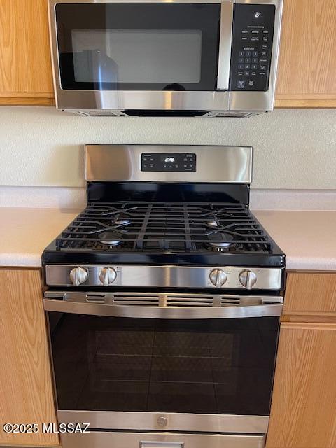 kitchen with appliances with stainless steel finishes