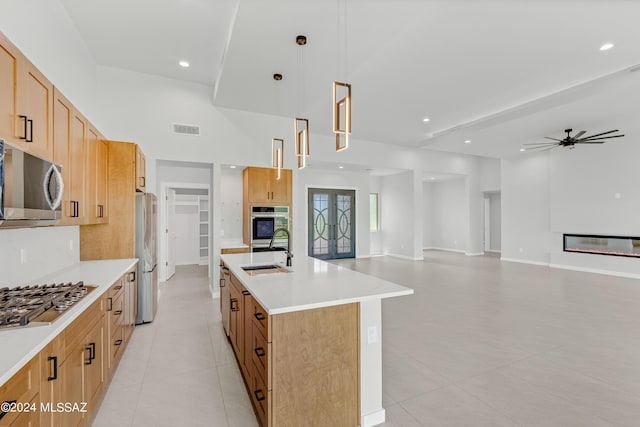 14821 E Diamond F Rnch Pl, Vail, AZ 85641 - kitchen featuring a sink, stainless steel appliances, light tile patterned flooring, visible vents, and ceiling fan