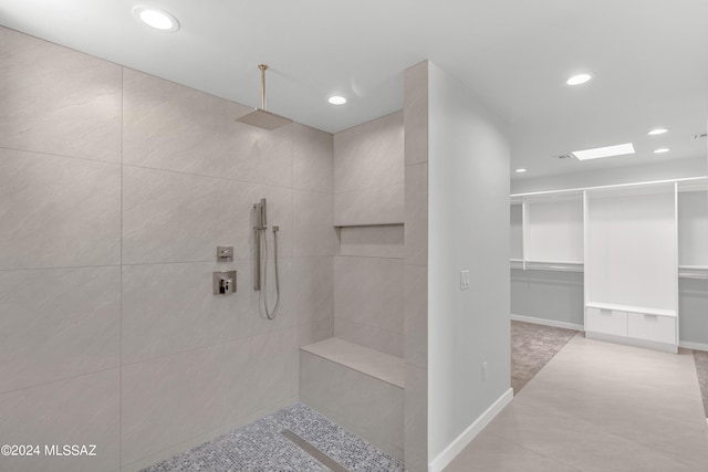 14821 E Diamond F Rnch Pl, Vail, AZ 85641 - bathroom with a tile shower, tile patterned flooring, recessed lighting, and baseboards