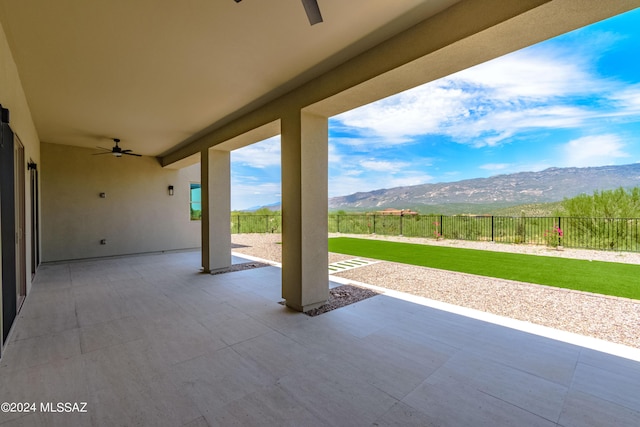 14821 E Diamond F Rnch Pl, Vail, AZ 85641 - view of patio / terrace with a mountain view, a fenced backyard, and ceiling fan