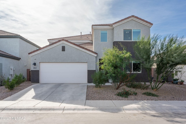 view of front of property with a garage