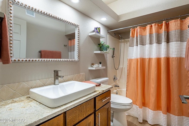 full bathroom featuring backsplash, shower / bathtub combination with curtain, vanity, and toilet