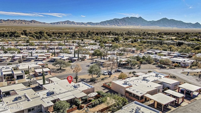 birds eye view of property featuring a mountain view