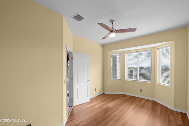 unfurnished bedroom featuring ceiling fan and light hardwood / wood-style flooring