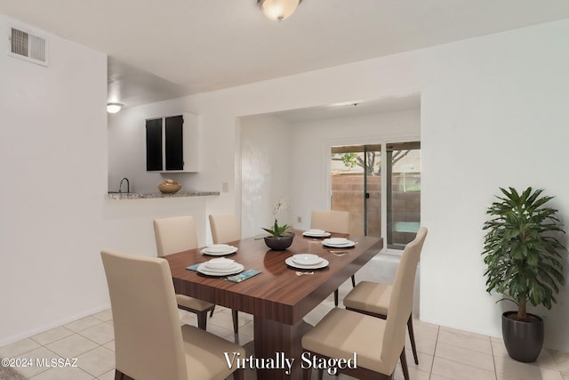 dining room with light tile patterned floors