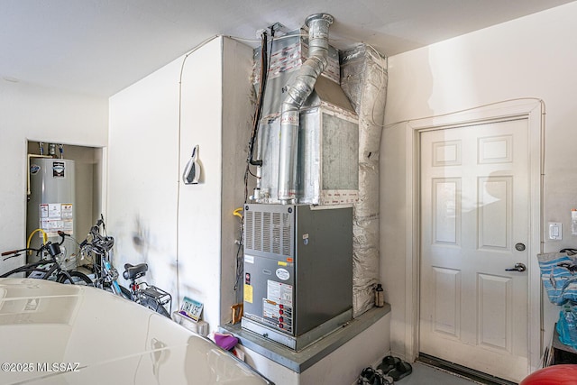 utility room with gas water heater