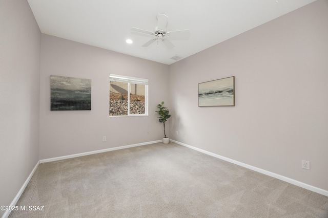 carpeted empty room with ceiling fan