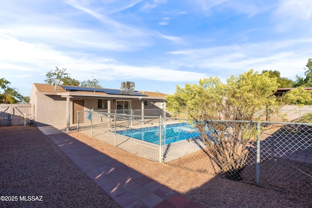 view of pool featuring central AC and a patio area