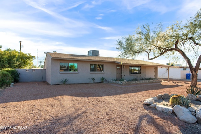 view of front of house featuring central air condition unit