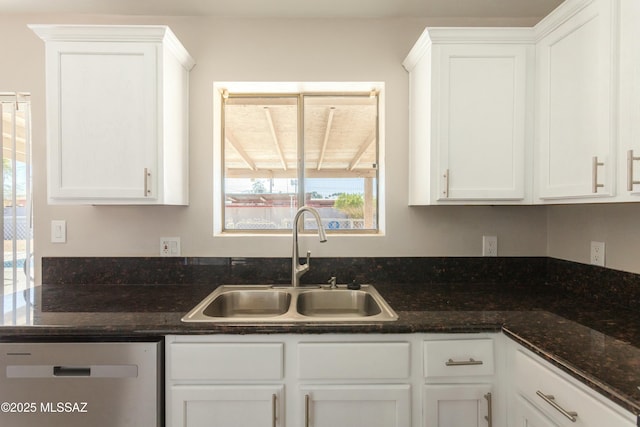 kitchen with white cabinetry, sink, and stainless steel dishwasher