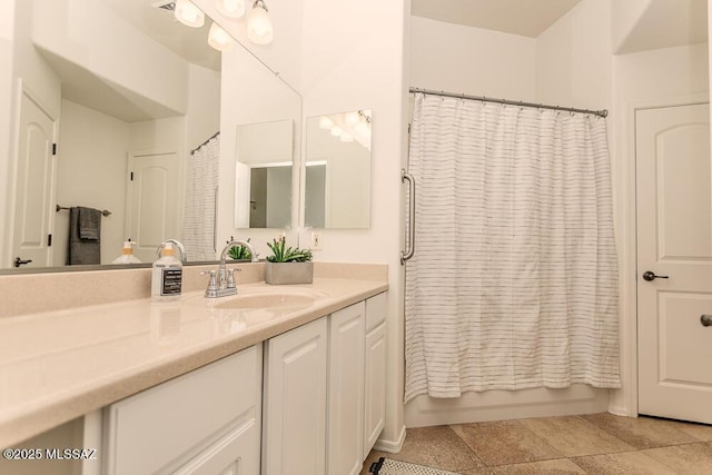 bathroom featuring shower / bath combination with curtain and vanity