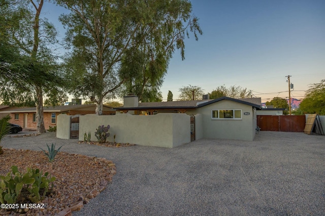 ranch-style house featuring a patio area