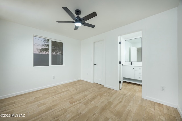 unfurnished bedroom with ceiling fan, light hardwood / wood-style floors, connected bathroom, and a closet