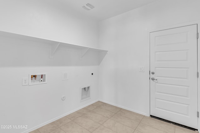 washroom featuring hookup for an electric dryer, hookup for a washing machine, hookup for a gas dryer, and light tile patterned flooring