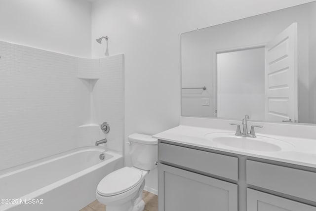 full bathroom featuring shower / tub combination, vanity, and toilet