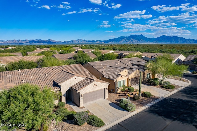 drone / aerial view featuring a mountain view