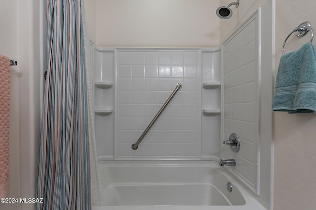 bathroom featuring shower / bath combo with shower curtain