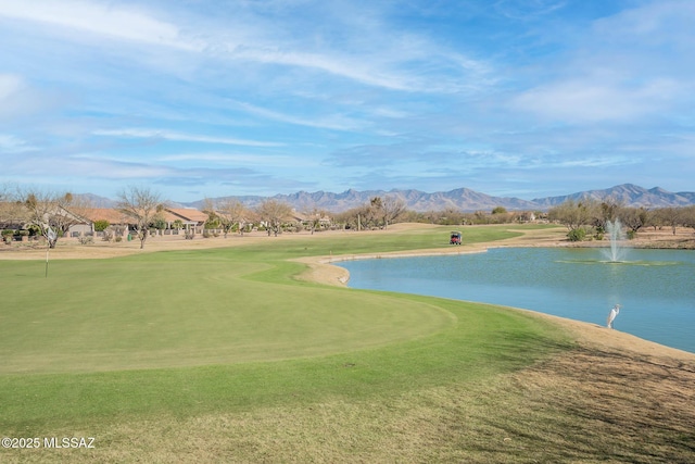 surrounding community featuring a water and mountain view