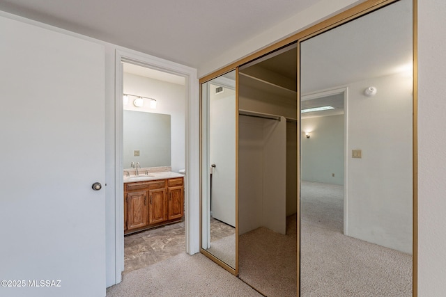 bathroom featuring visible vents and vanity