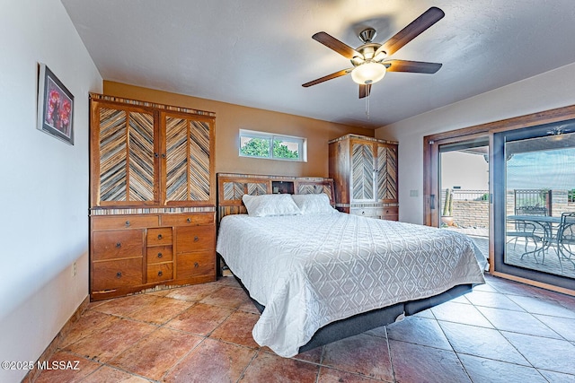 bedroom featuring access to outside and ceiling fan