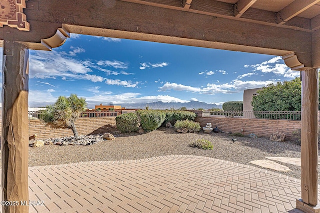 view of patio with a mountain view