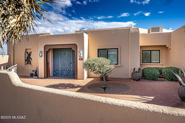 view of pueblo-style home