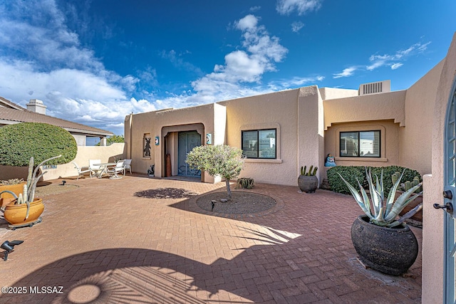 exterior space with a patio