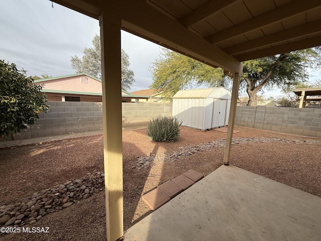 view of patio / terrace featuring a shed