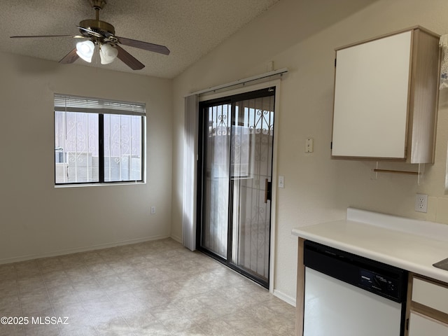 kitchen featuring white cabinets, dishwasher, ceiling fan, and a textured ceiling