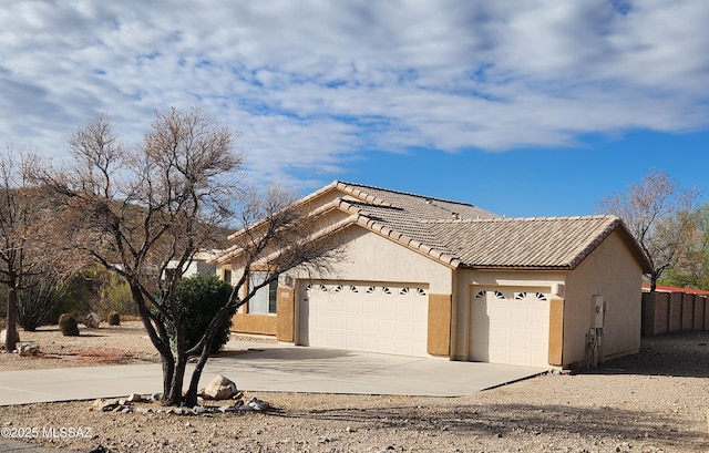 ranch-style home with a garage