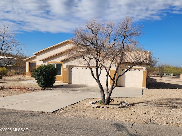 view of front of home with a garage