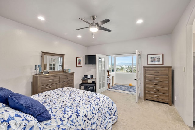 bedroom with a ceiling fan, access to exterior, recessed lighting, and light carpet