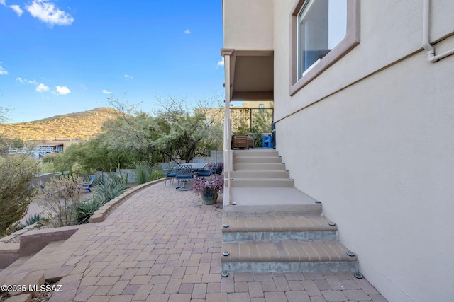 staircase featuring a mountain view