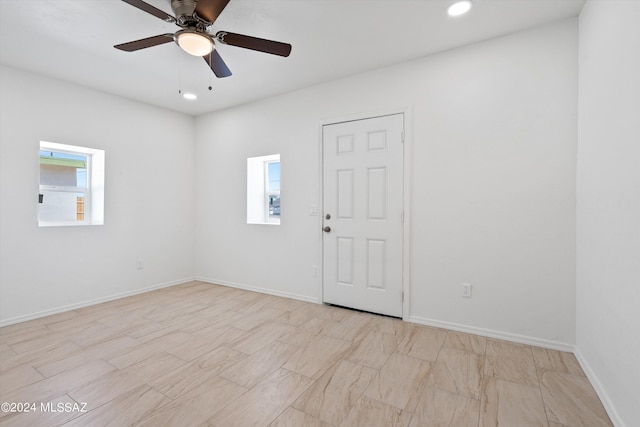 empty room featuring ceiling fan