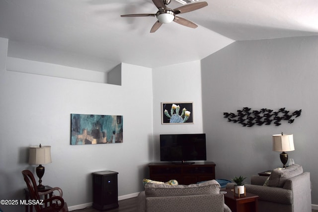 living room featuring wood-type flooring, ceiling fan, and lofted ceiling