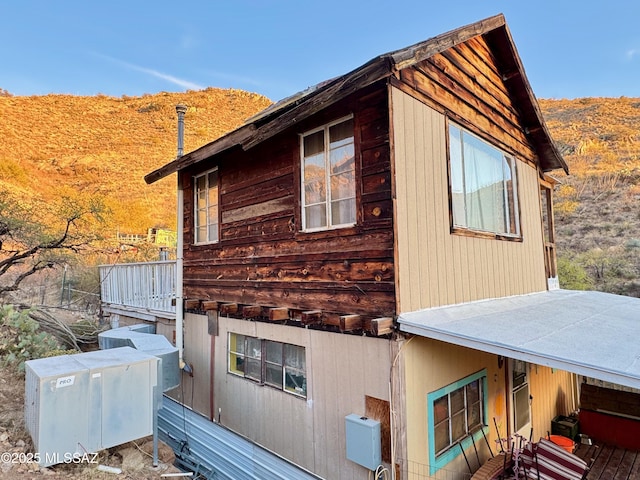 view of property exterior with a balcony