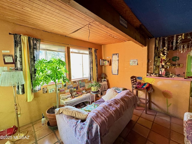 living room featuring tile patterned flooring and wooden ceiling