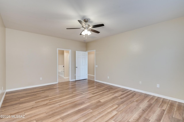 unfurnished room with ceiling fan and light wood-type flooring