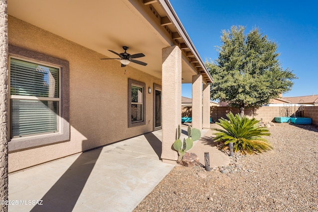 view of patio / terrace featuring ceiling fan