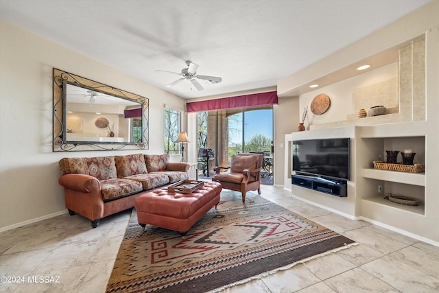 living room with ceiling fan