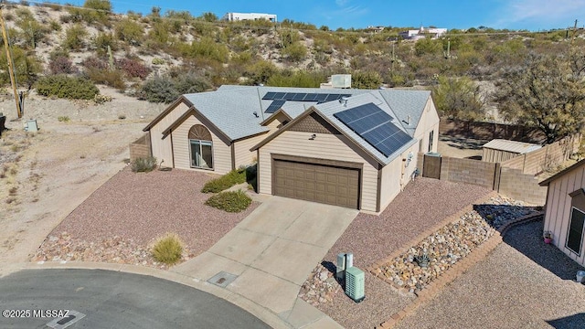 view of front of house featuring solar panels