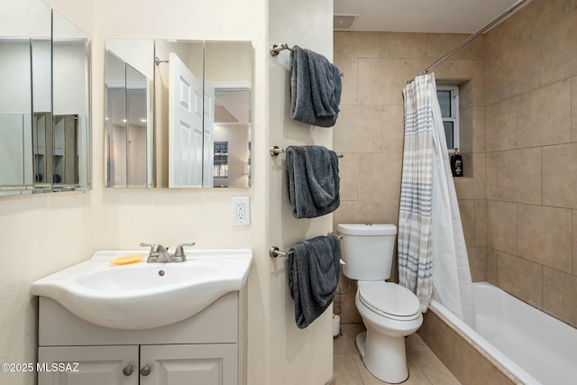 full bathroom featuring vanity, shower / bath combination with curtain, and toilet