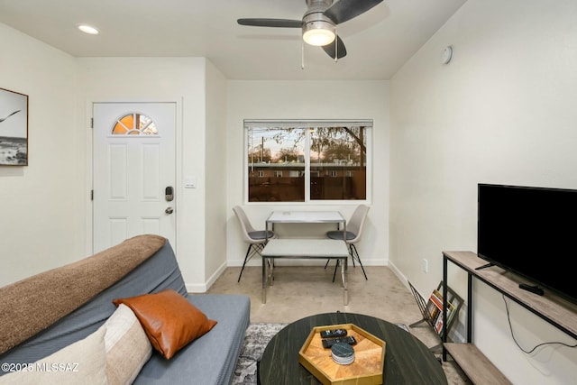 carpeted living room featuring ceiling fan