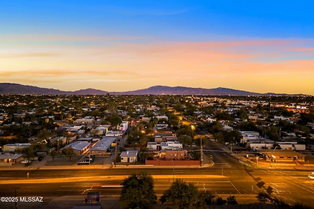 aerial view at dusk with a mountain view