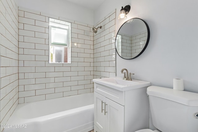 full bathroom with vanity, toilet, and shower / tub combination