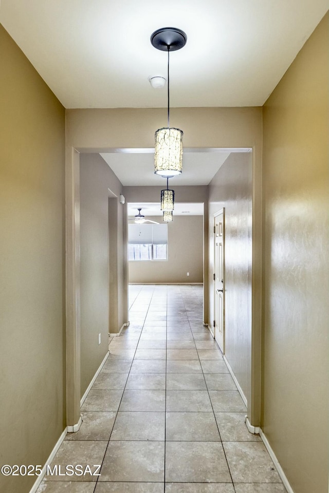 corridor featuring light tile patterned flooring