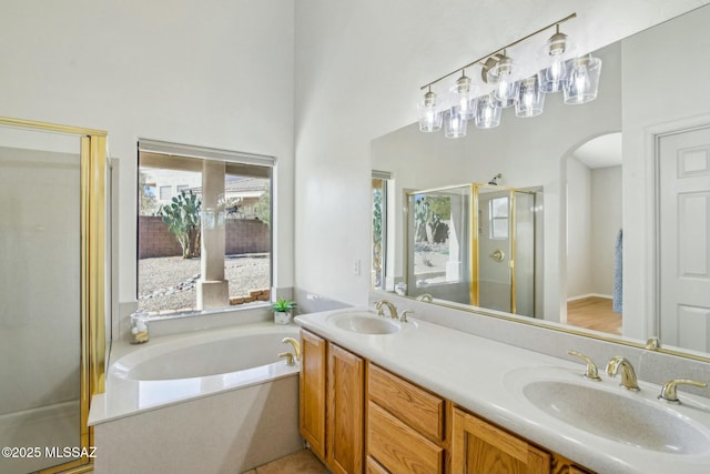 bathroom with vanity and plus walk in shower