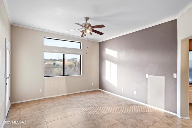 tiled spare room featuring ceiling fan and crown molding